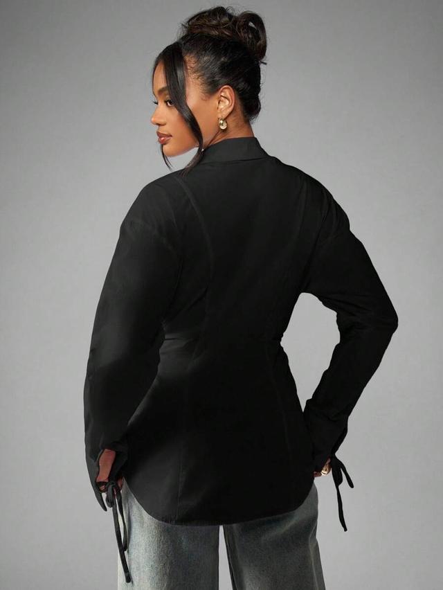 black oversized button down blouse with ruched waist