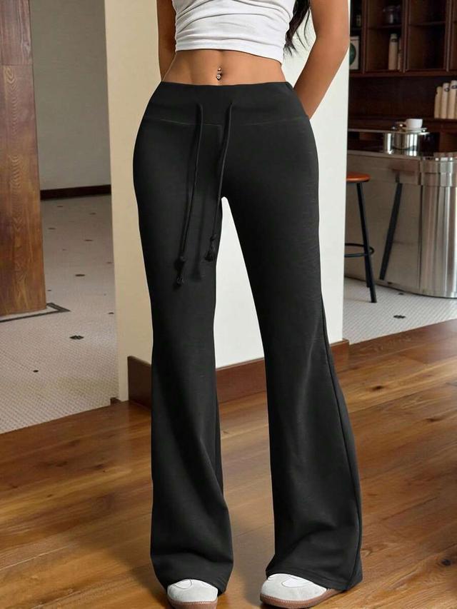 black drawstring waist flared leg casual trousers