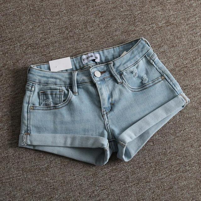 light blue distressed black denim cuffed shorts