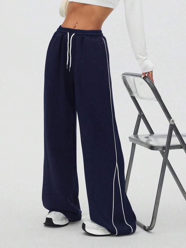 navy waffle texture loose jogger pants with side stripe