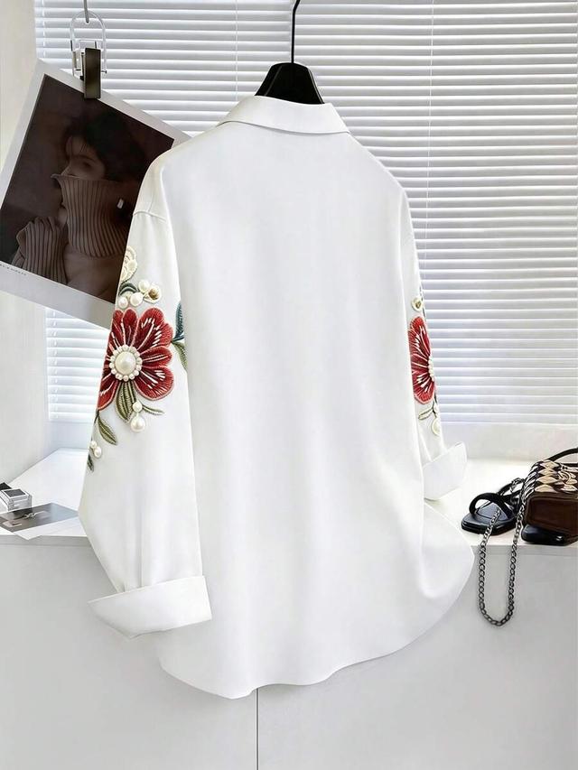 white floral embroidered long sleeve blouse