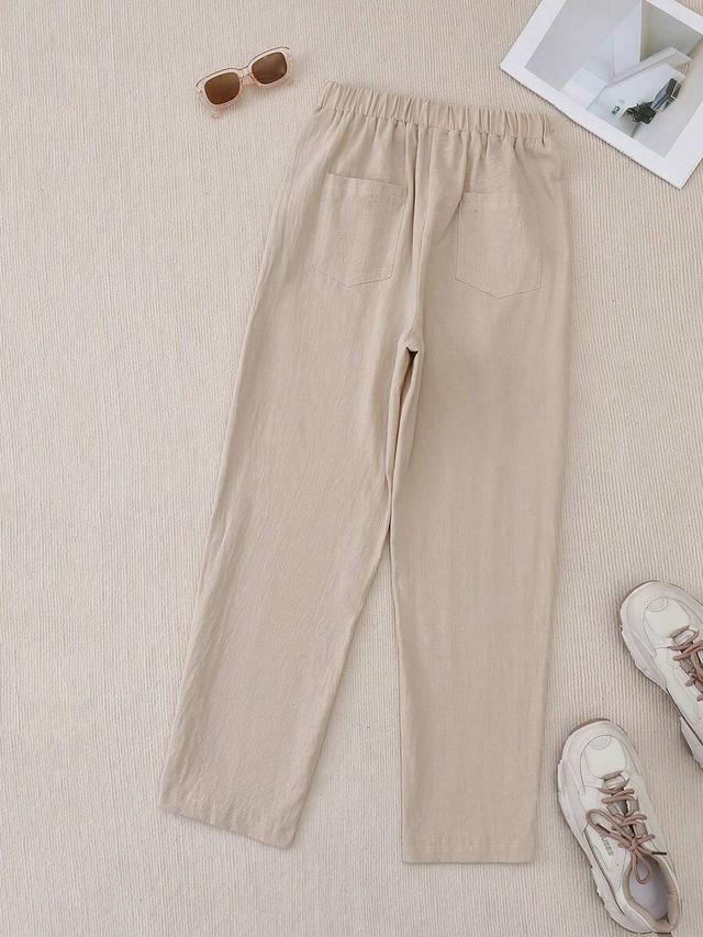 beige casual cropped trousers with button detail