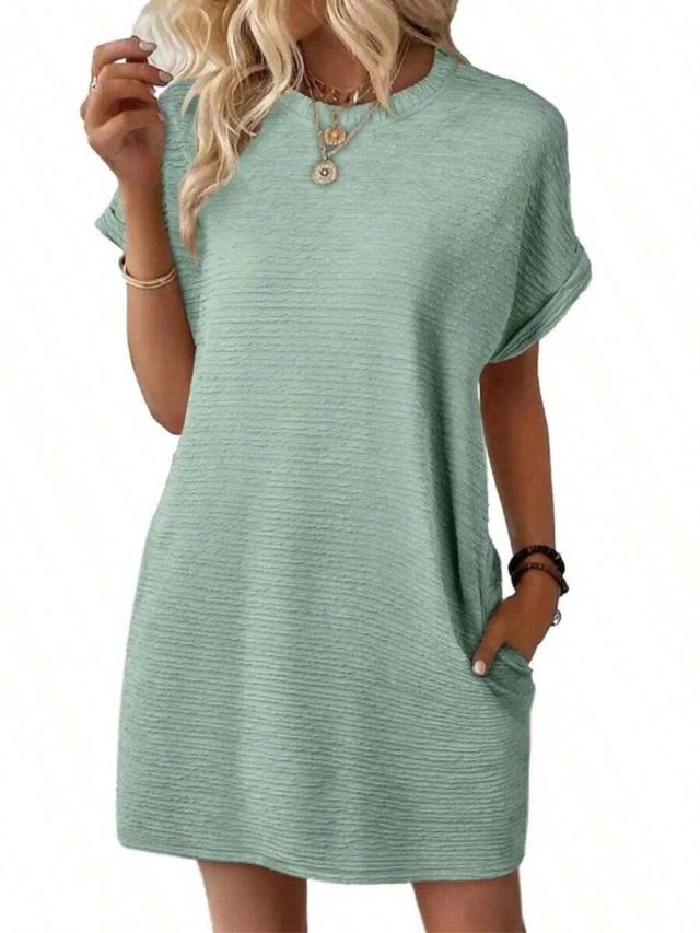 mint green textured shift dress with pockets