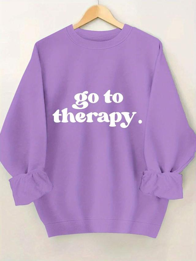 purple crewneck sweatshirt with white graphic print
