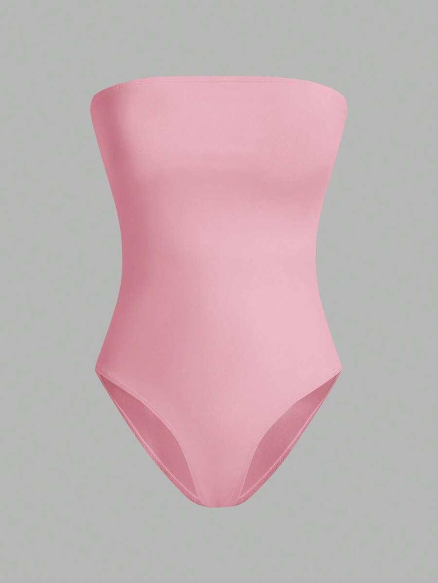 pink seamless strapless bodysuit in black white and pink