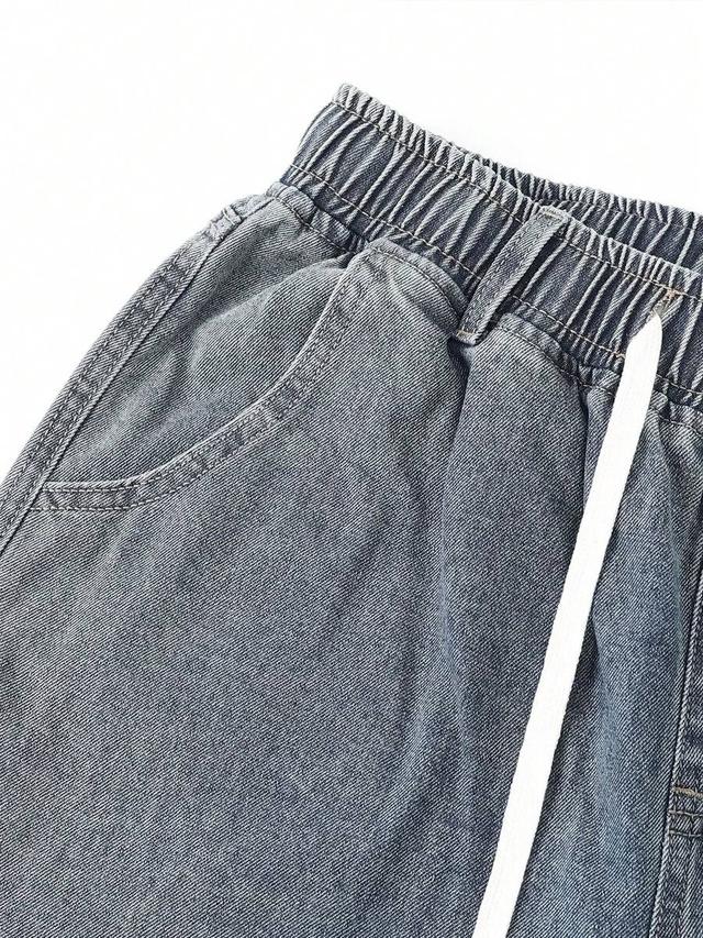 dark grey vintage art masterpiece print light-wash wide-leg denim jeans