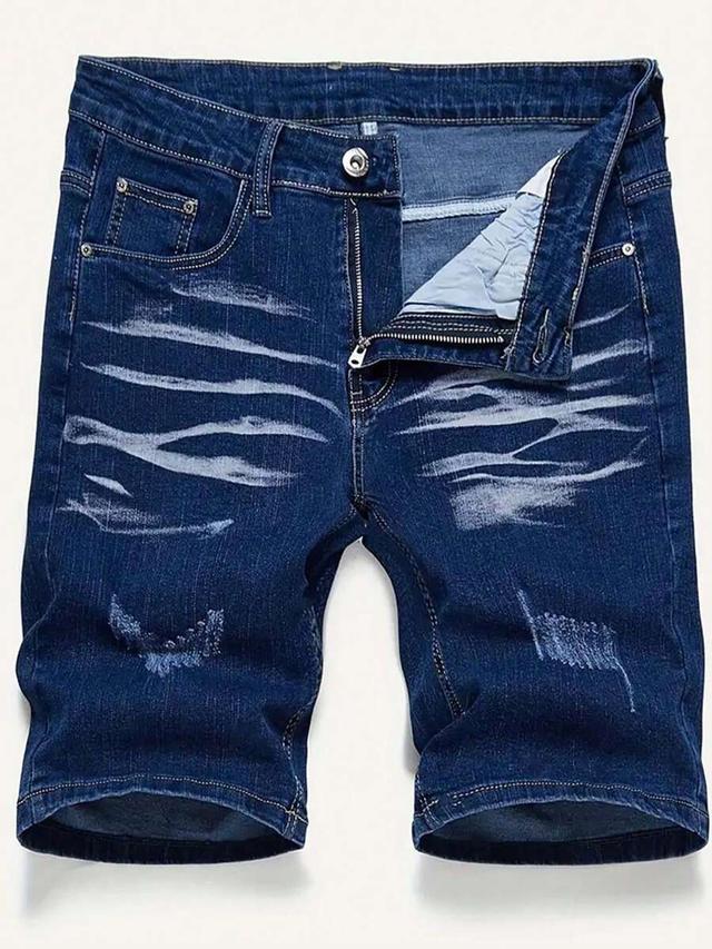 blue men's distressed color block stretch denim shorts