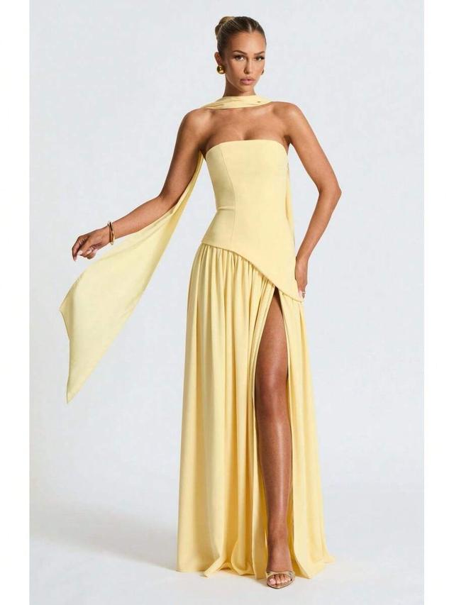 yellow strapless gown with asymmetric draped bodice