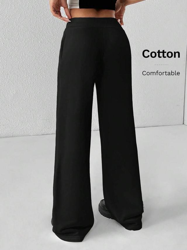 black low-rise wide-leg knit sweatpants