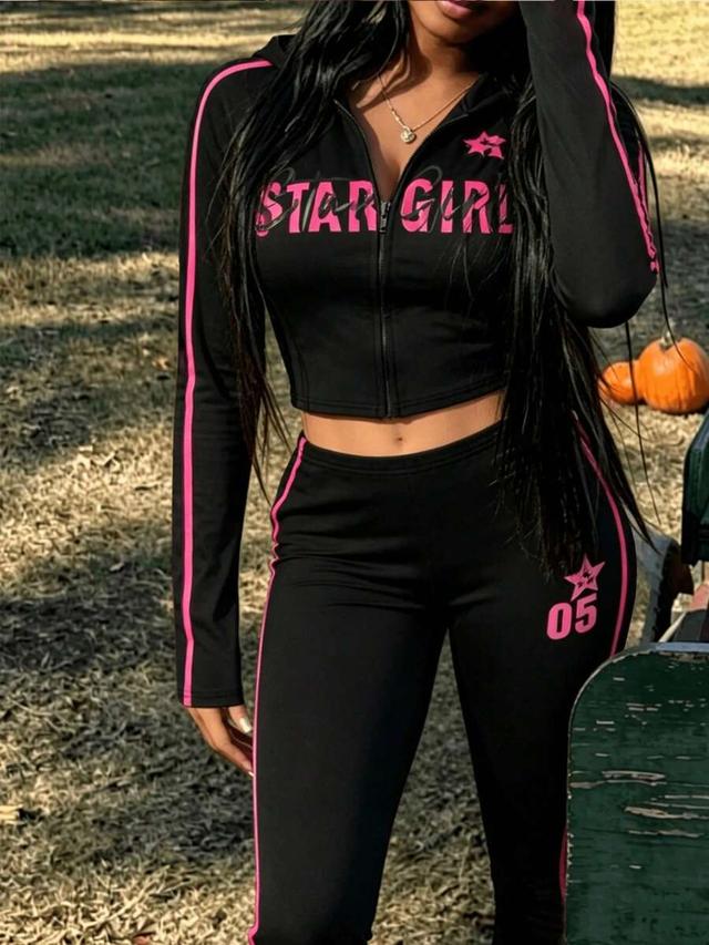 black graphic zip-up hoodie and flared pants set