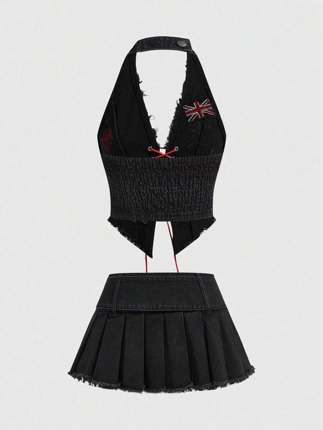black smocked halter corset top and pleated mini skirt set