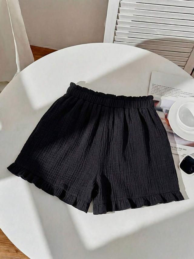 black textured cotton ruffle hem casual shorts