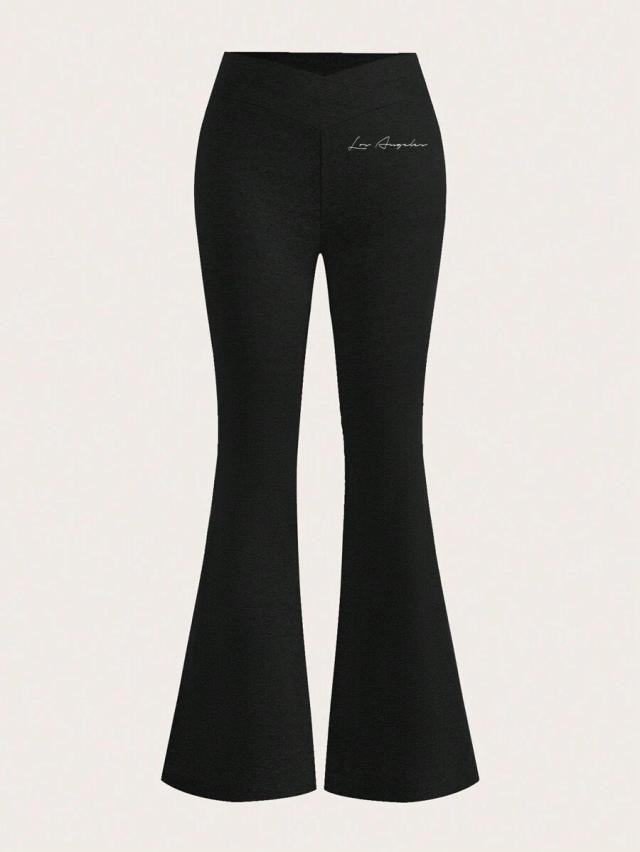 black women's black and grey cross waistband skinny flare pants