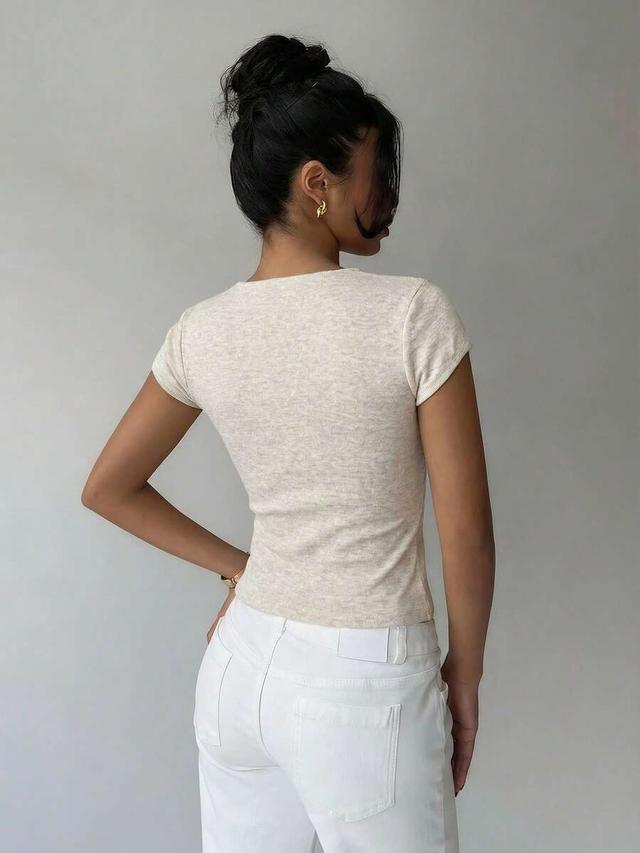 light beige v-neck ruched fitted short sleeve top