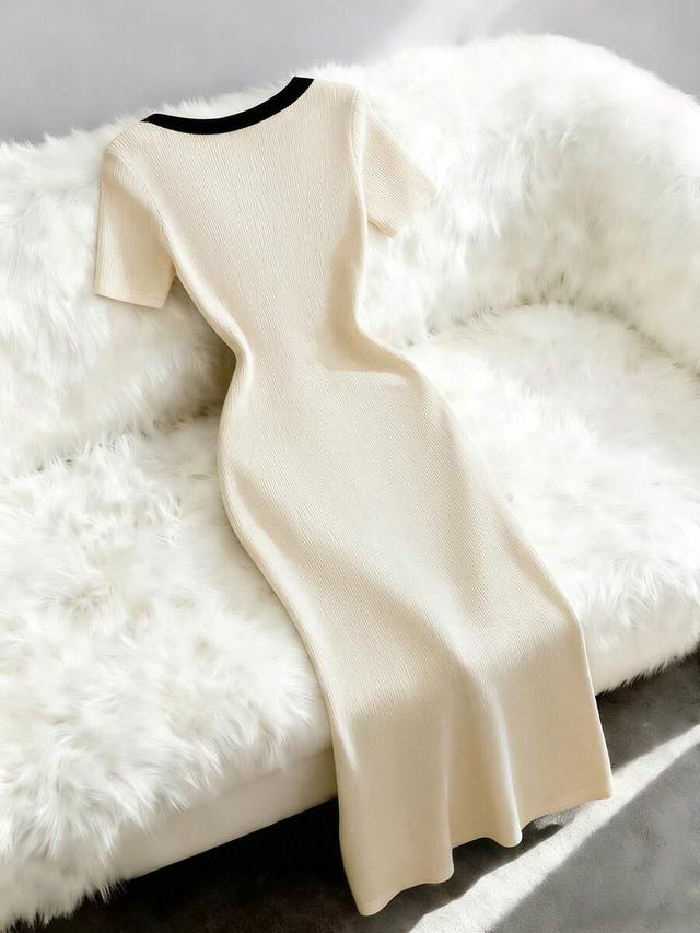 elegant black and white ribbed knit v-neck dress