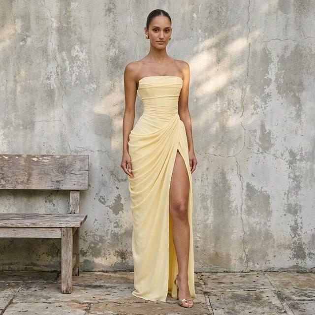pale yellow strapless draped evening gown