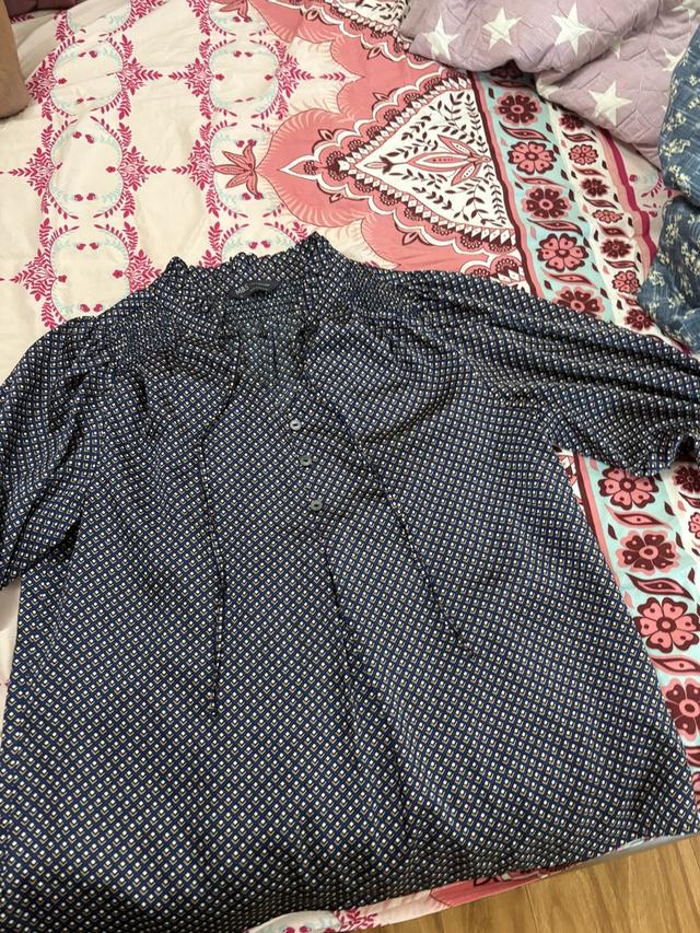 navy geometric print blouse with smocked neckline