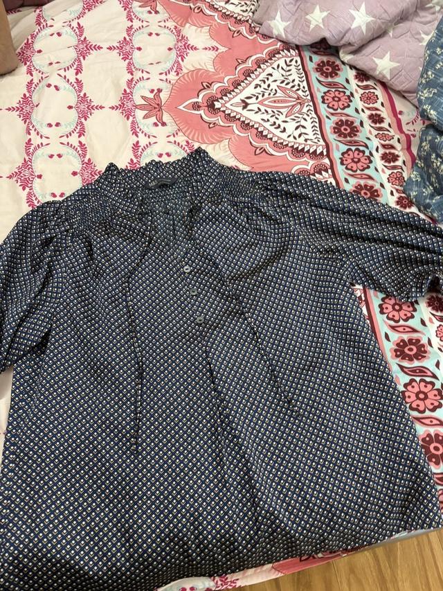 navy geometric print blouse with smocked neckline