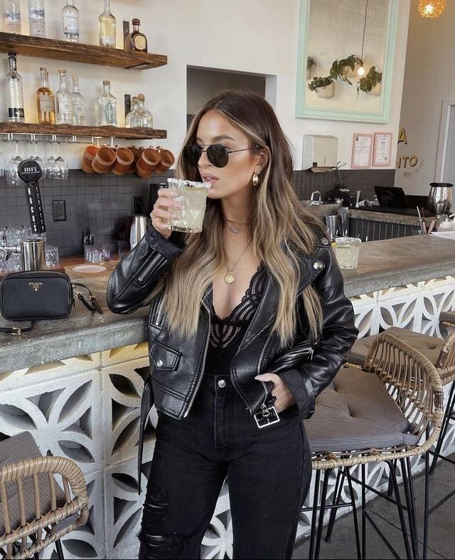 black faux leather moto jacket with silver hardware