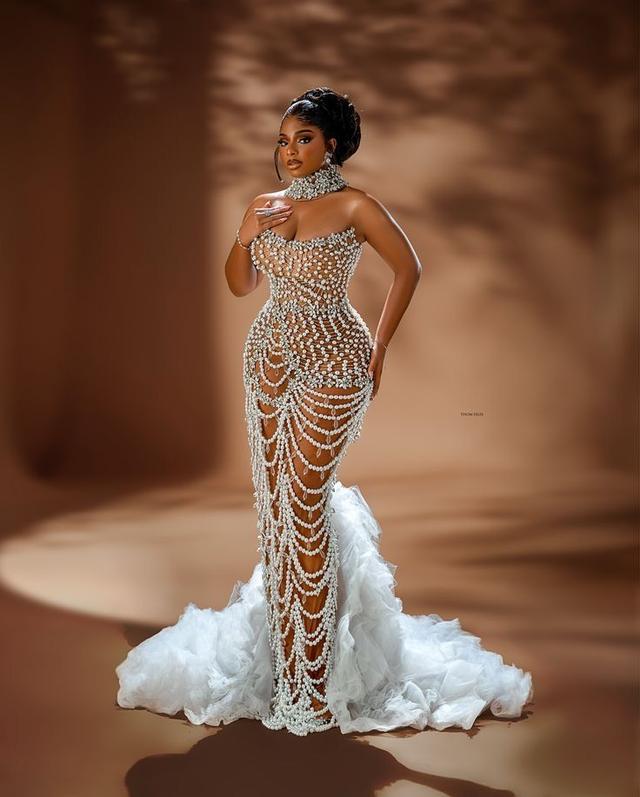 heavily beaded pearl and crystal mesh evening gown