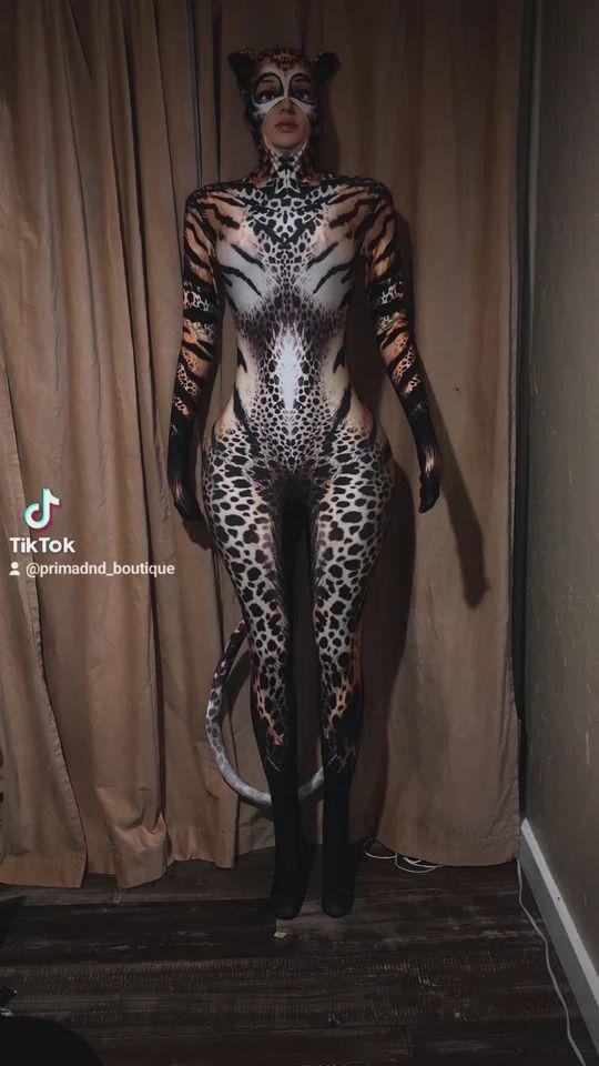 leopard print long sleeve jumpsuit with attached tail