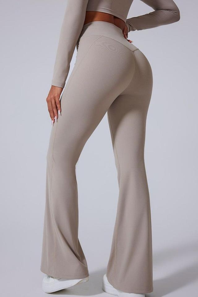 beige high-waisted flared activewear leggings