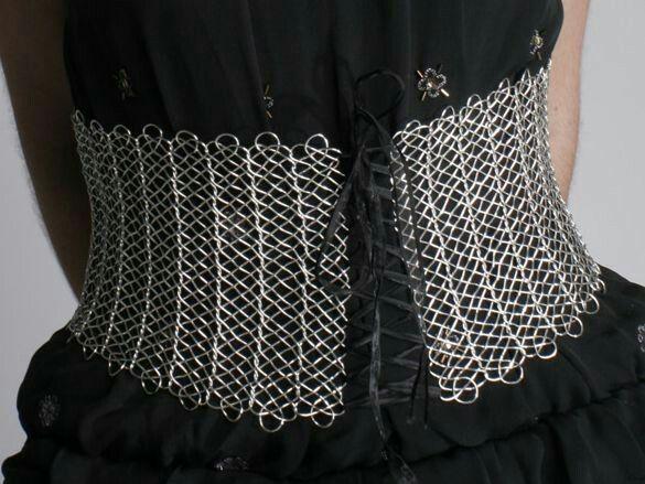 black silk dress with metallic wire corset overlay