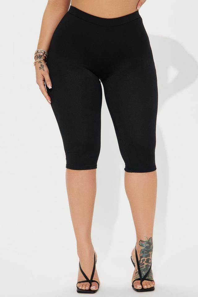 black high-waisted stretch knit biker shorts