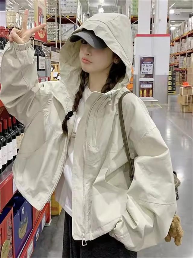 oversized beige hooded windbreaker jacket