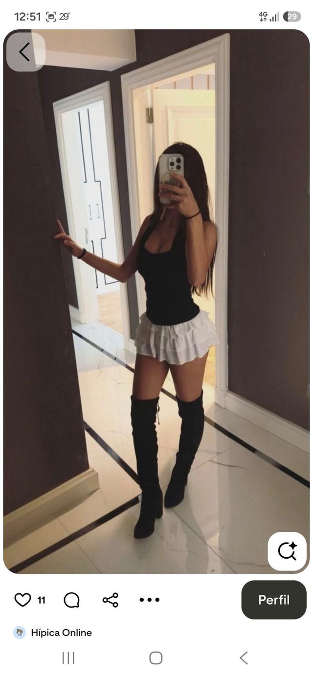 black ribbed tank top with white tiered ruffle skirt