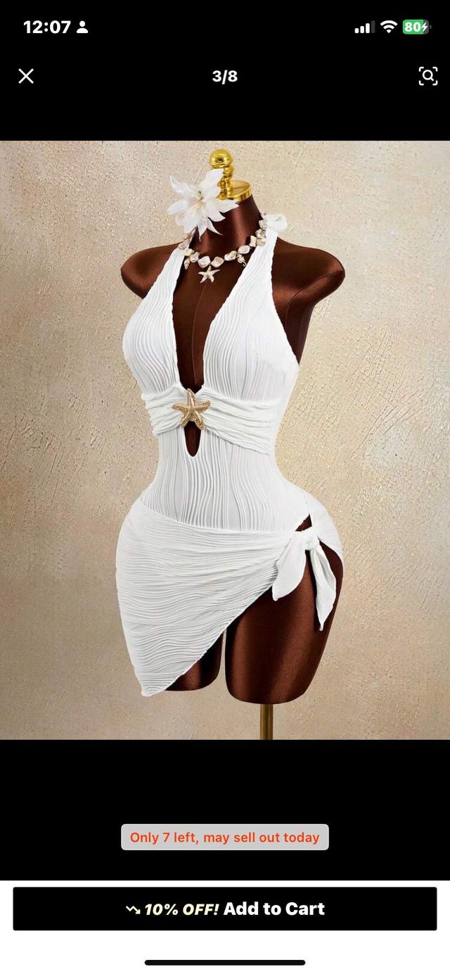white pleated halter neck dress with starfish detail