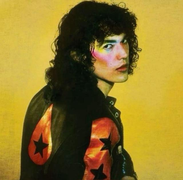 black leather jacket with red star appliqué