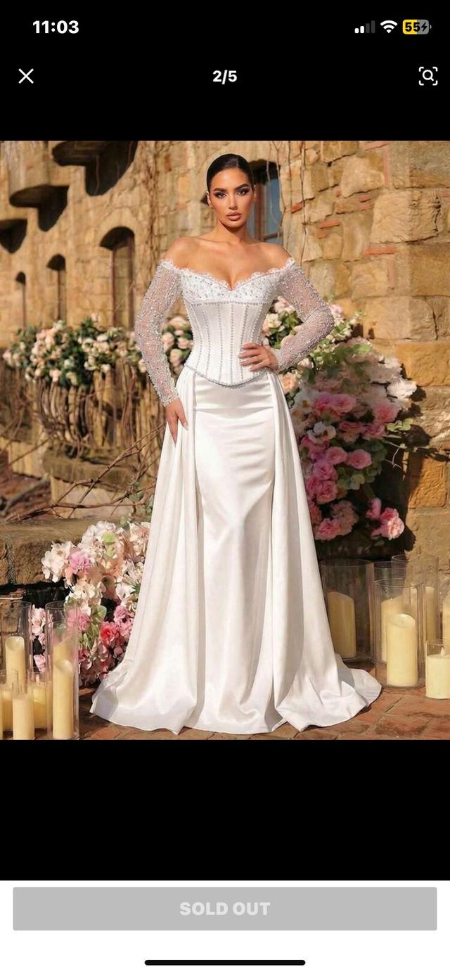 off-shoulder corset bridal gown with beaded sleeves