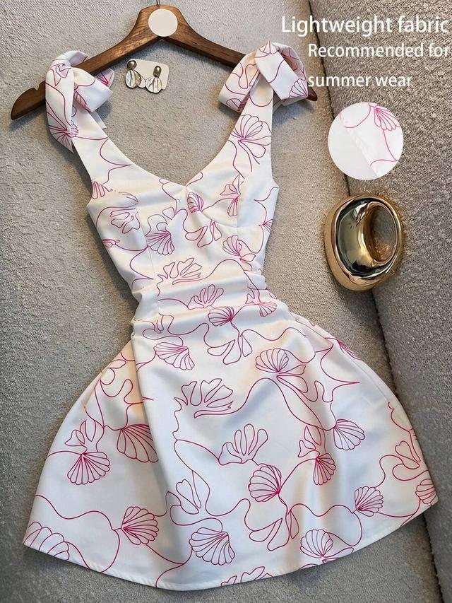 white mini dress with pink shell line art