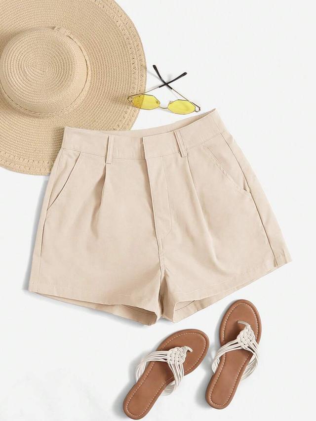 beige high-waisted pleated tailored shorts
