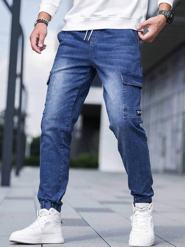 washed denim cargo joggers with flap pockets