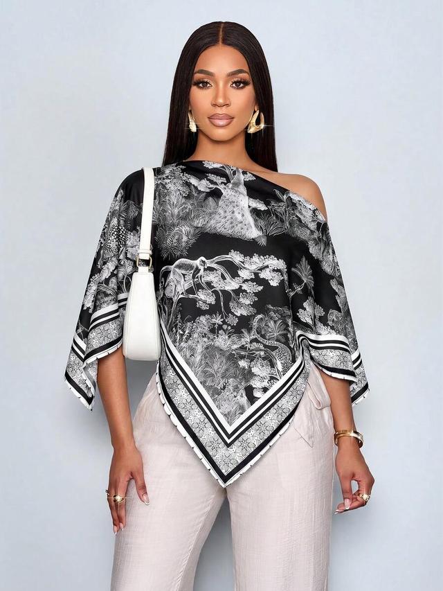 black and white patterned asymmetric hem batwing blouse