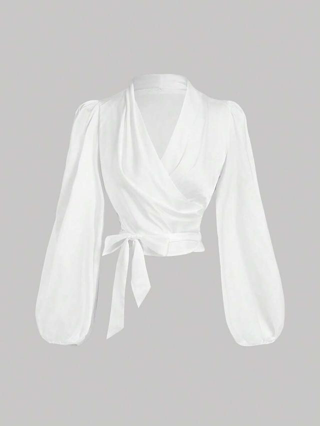 white wrap-around tie-up bow batwing sleeve blouse
