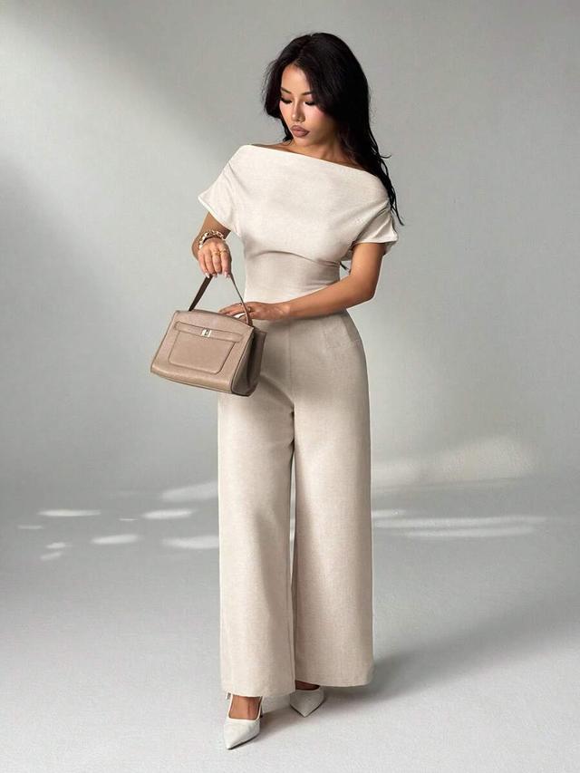 beige linen off-shoulder blouse and wide-leg trousers set