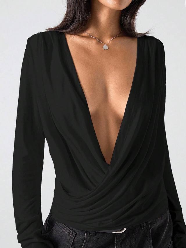 solid black long sleeve plunging neck draped top