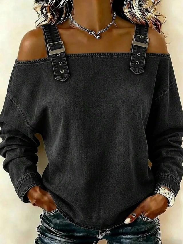 women's black denim long-sleeve top with buckle straps