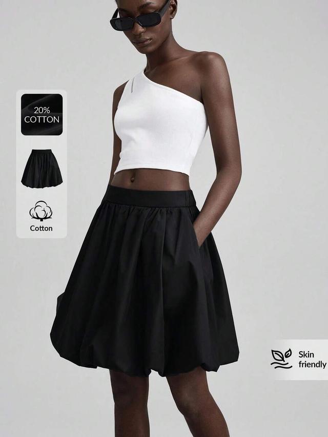 solid black cotton bubble mini skirt