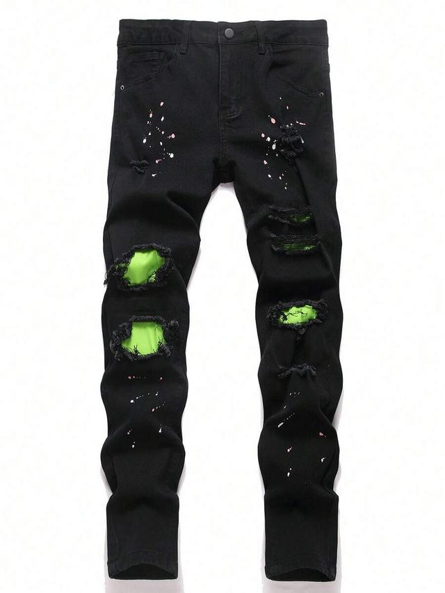 black distressed denim jeans with neon green lining