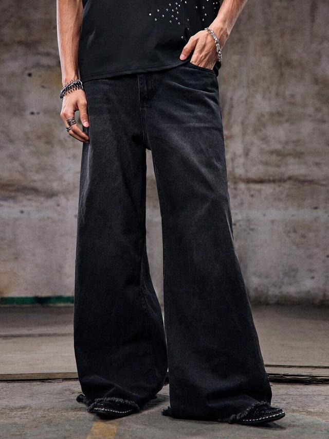 black washed baggy raw hem flare jeans