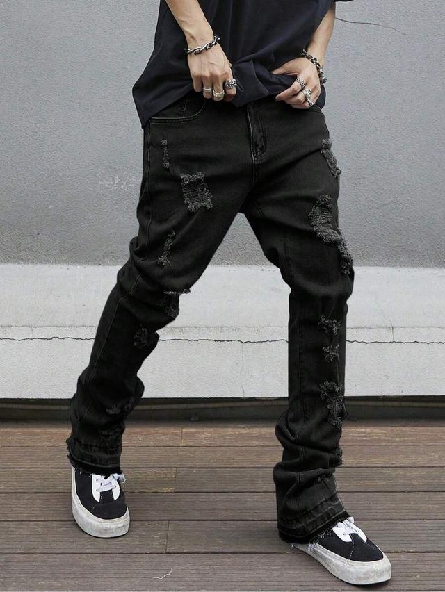 skinny flared distressed black denim maxi pants