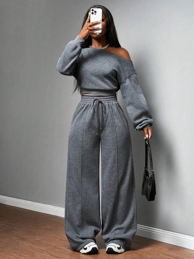 dark grey lounge set with zip collar top