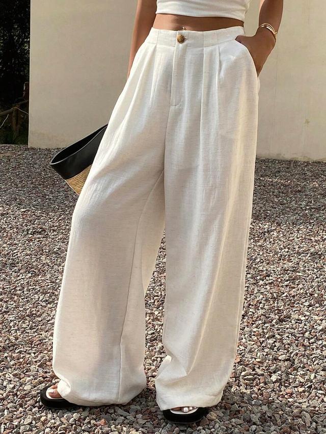 solid white linen wide leg trousers with pockets