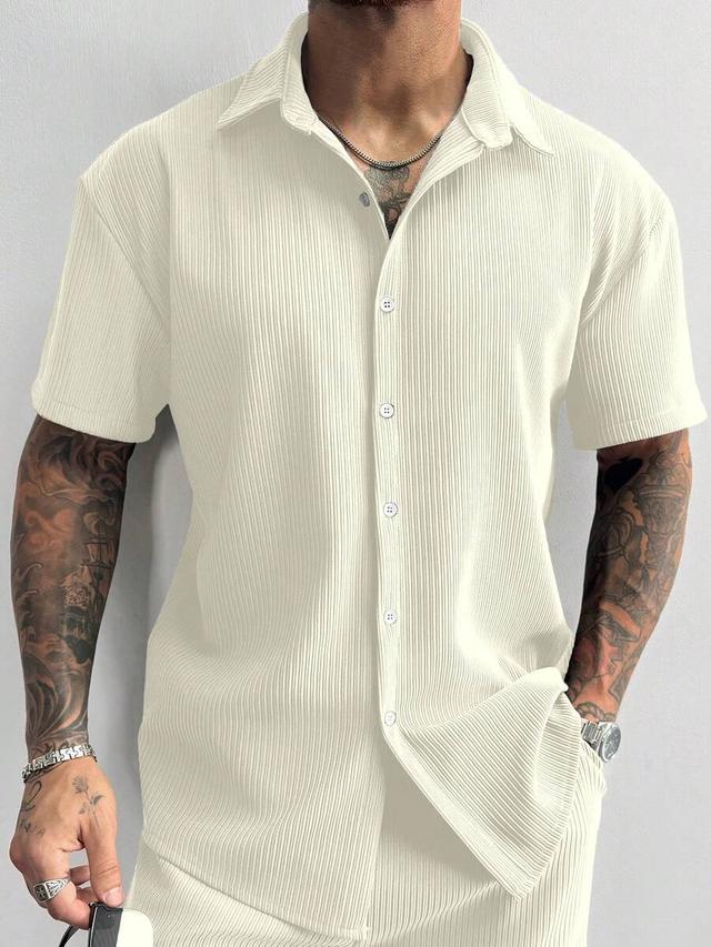 textured solid color ribbed knit short sleeve lapel shirt