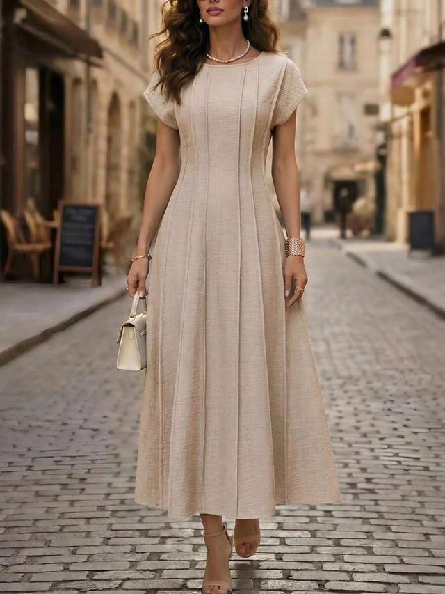elegant beige waist-cinching long dress with vertical paneling