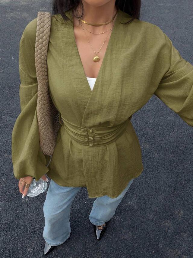 olive green waist-cinching lantern sleeve blouse